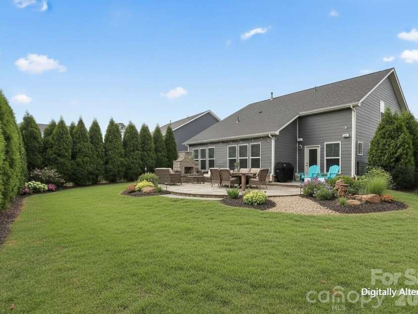 709 Hinterland Lane, Matthews, NC 28104.  MLS# CAR4358766, YatesRealty ID 13570. The possibilities are endless with this backyard!
