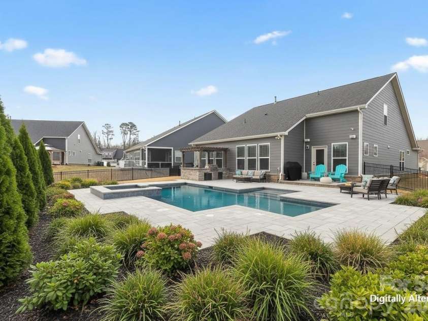 709 Hinterland Lane, Matthews, NC 28104.  MLS# CAR4358766, YatesRealty ID 13570. The possibilities are endless with this backyard!