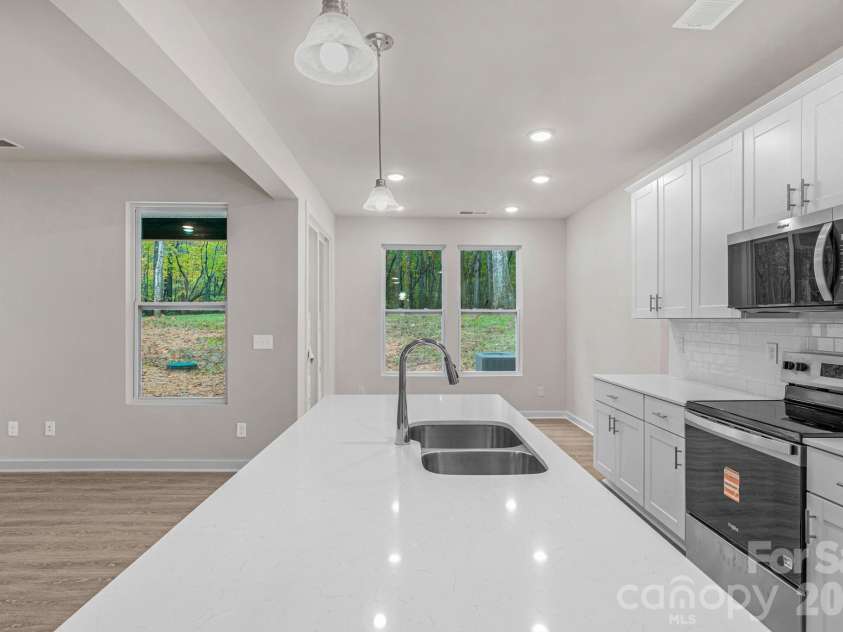 5624 Tipton Road, Monroe, NC 28112.  MLS# CAR4427682, YatesRealty ID 13571. Large Kitchen island