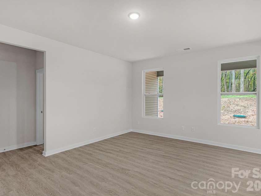 5624 Tipton Road, Monroe, NC 28112.  MLS# CAR4427682, YatesRealty ID 13571. Living leading to primary