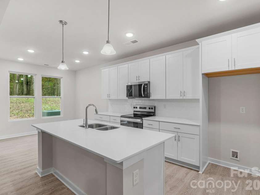 5624 Tipton Road, Monroe, NC 28112.  MLS# CAR4427682, YatesRealty ID 13571. Open Kitchen with large island