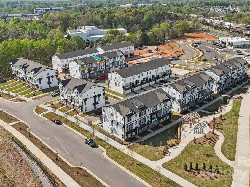 3114 Stelfox Street, Charlotte, NC 28262.  MLS# CAR4259727, YatesRealty ID 13576. Senata at Research Park Community Aerial View