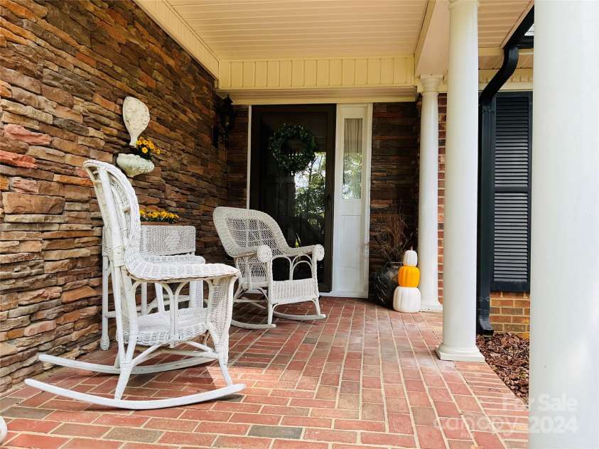 701 Whippoorwill Lane, Concord, NC 28025.  MLS# CAR4188719, YatesRealty ID 1358. Front Porch
