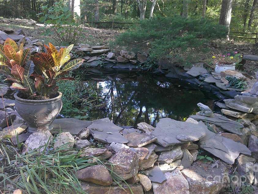 701 Whippoorwill Lane, Concord, NC 28025.  MLS# CAR4188719, YatesRealty ID 1358. Pond / Was a koi pond at one time.
