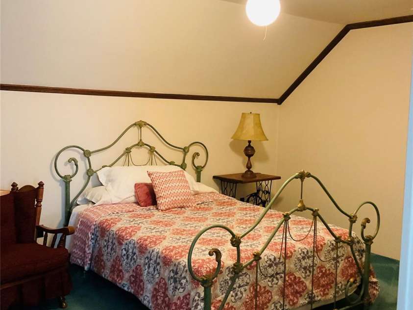 701 Whippoorwill Lane, Concord, NC 28025.  MLS# CAR4188719, YatesRealty ID 1358. Upstairs Bedroom with floored storage