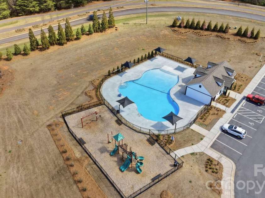 14083 Bobby Jones Drive, Lancaster, SC 29720.  MLS# CAR4356019, YatesRealty ID 13581. Pool and Playground