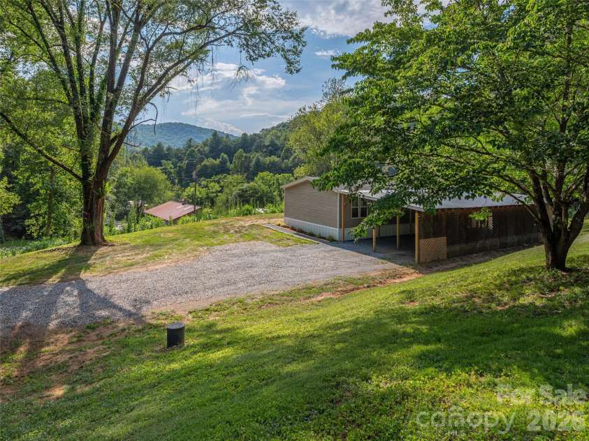 15 Joe Davis Road, Sylva, NC 28779.  MLS# CAR4327094, YatesRealty ID 13583. 