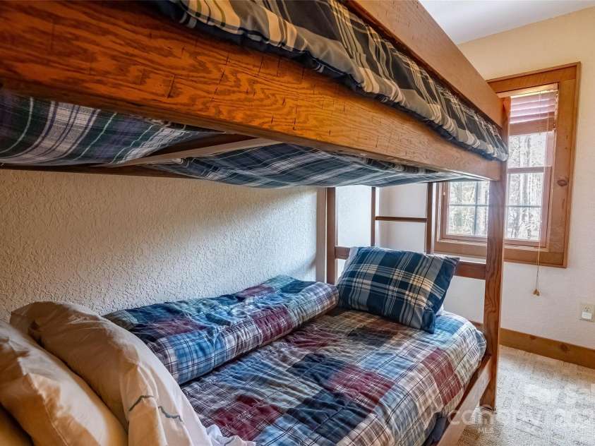 620 Sapphire Valley Road, Cashiers, NC 28717.  MLS# CAR4329121, YatesRealty ID 1359. Bunk Room Suite Bunk Beds at the top of the stairs from the 2nd floor. All furniture here conveys.