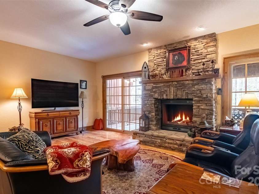 620 Sapphire Valley Road, Cashiers, NC 28717.  MLS# CAR4329121, YatesRealty ID 1359. Living Room from the right side. Buffet matching the hutch in the dining room does not convey.