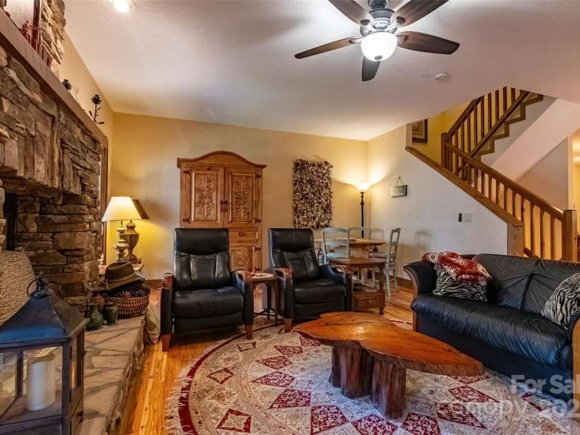 620 Sapphire Valley Road, Cashiers, NC 28717.  MLS# CAR4329121, YatesRealty ID 1359. Living Room, looking back to the stairway to the upper floors.