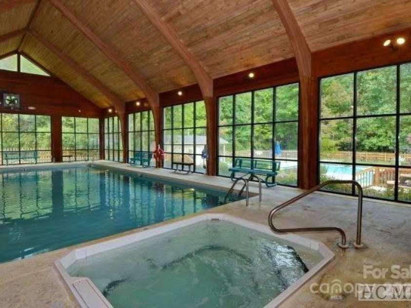 620 Sapphire Valley Road, Cashiers, NC 28717.  MLS# CAR4329121, YatesRealty ID 1359. SVMA Amenities include its indoor pool and hot tub as well, in out of the sun or rain, and available to play in or relax by!