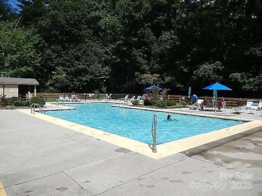 620 Sapphire Valley Road, Cashiers, NC 28717.  MLS# CAR4329121, YatesRealty ID 1359. SVMA Amenities include its outdoor pool and patio area to play in or relax by!