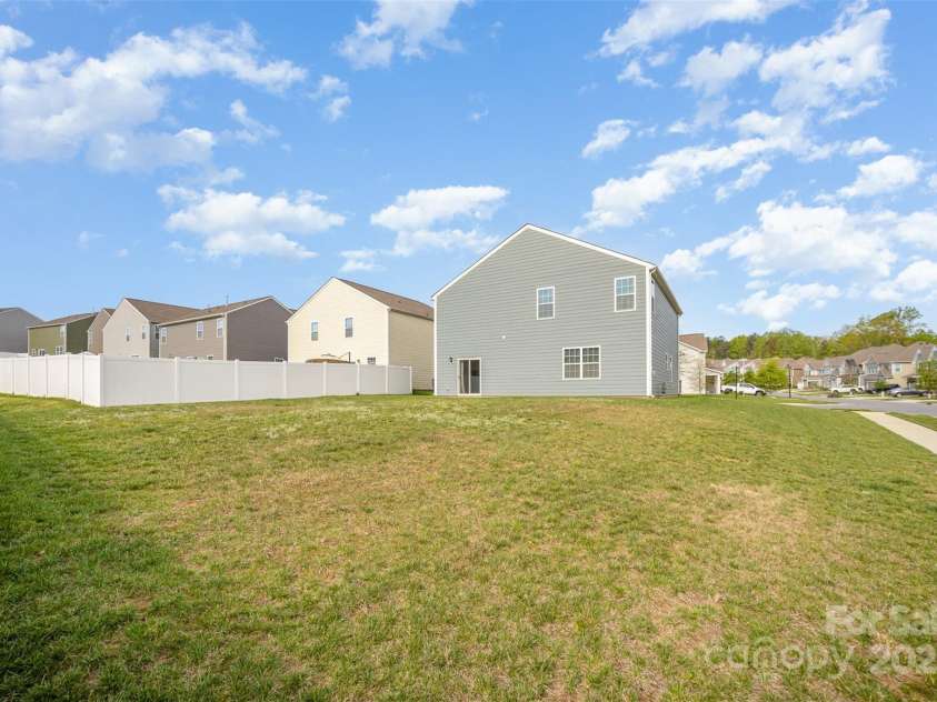 138 Maritime Street, Mooresville, NC 28117.  MLS# CAR4251677, YatesRealty ID 13592. Large Level Yard