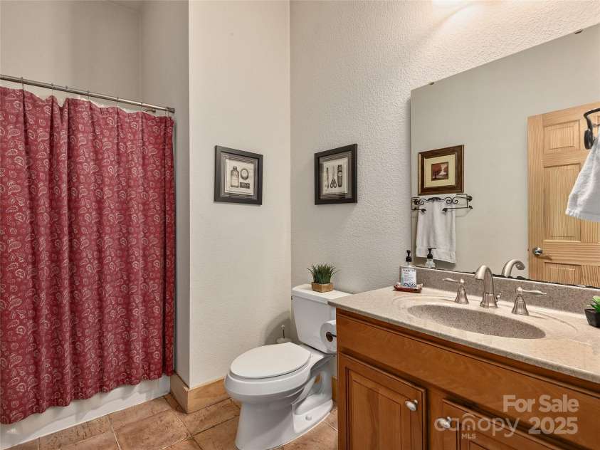 330 Vista Drive, Mars Hill, NC 28754.  MLS# CAR4229157, YatesRealty ID 13598. Lower level additional full bathroom.