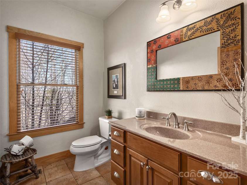 330 Vista Drive, Mars Hill, NC 28754.  MLS# CAR4229157, YatesRealty ID 13598. Main level half bath.