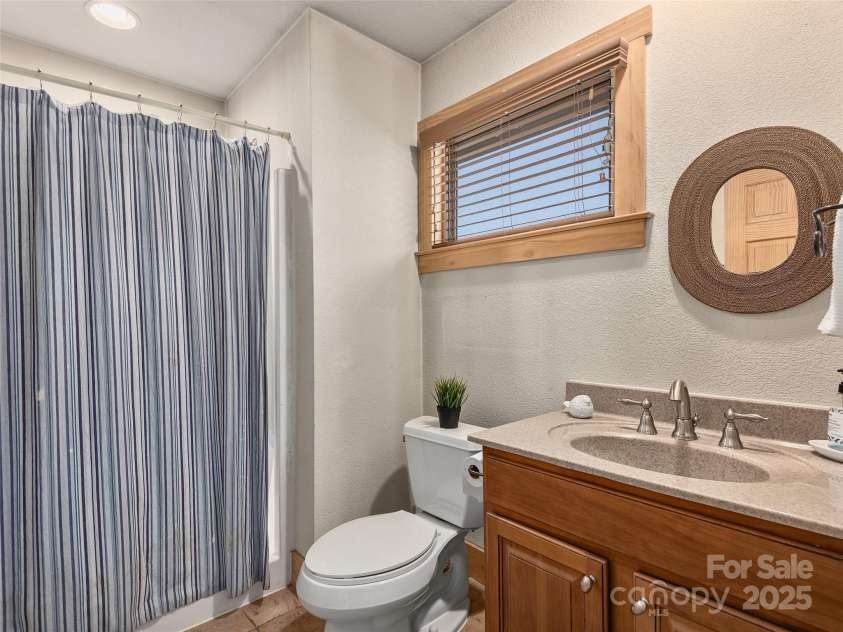 330 Vista Drive, Mars Hill, NC 28754.  MLS# CAR4229157, YatesRealty ID 13598. Upper level ensuite.