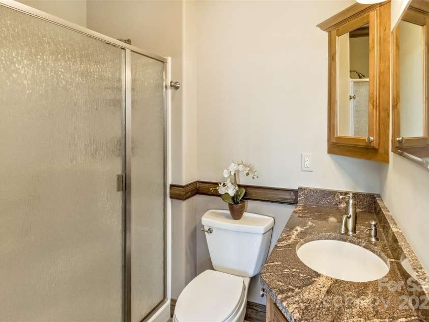 22 Valley Drive, Weaverville, NC 28787.  MLS# CAR4244497, YatesRealty ID 13599. And, its ensuite bath