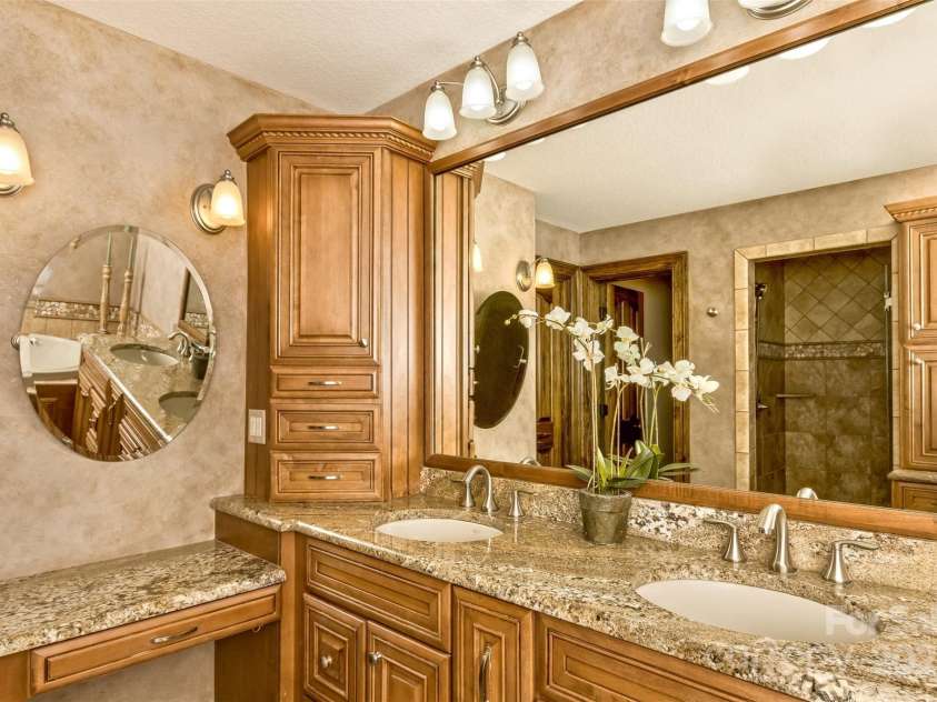 22 Valley Drive, Weaverville, NC 28787.  MLS# CAR4244497, YatesRealty ID 13599. Plenty of primary bath cabinets.