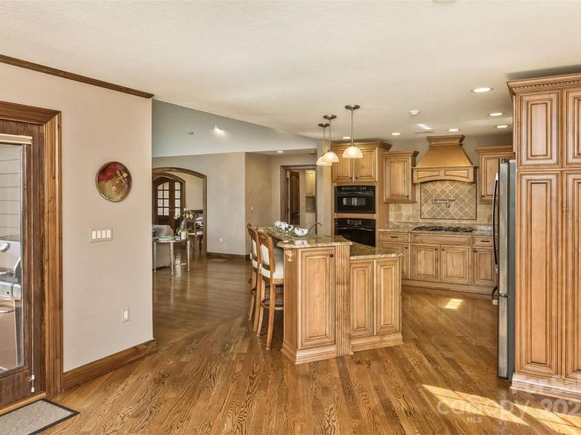 22 Valley Drive, Weaverville, NC 28787.  MLS# CAR4244497, YatesRealty ID 13599. The deck opens to the kitchen area for easy grilling