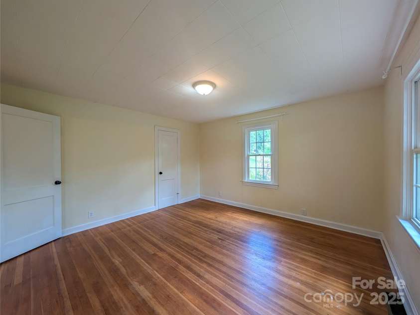 95 Lady Bug Lane, Burnsville, NC 28714.  MLS# CAR4206406, YatesRealty ID 13600. Additional view of Bedroom off from living area