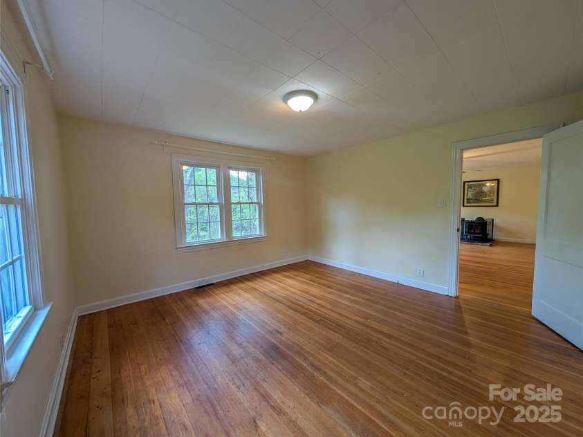 95 Lady Bug Lane, Burnsville, NC 28714.  MLS# CAR4206406, YatesRealty ID 13600. Additional view of Bedroom off from living area