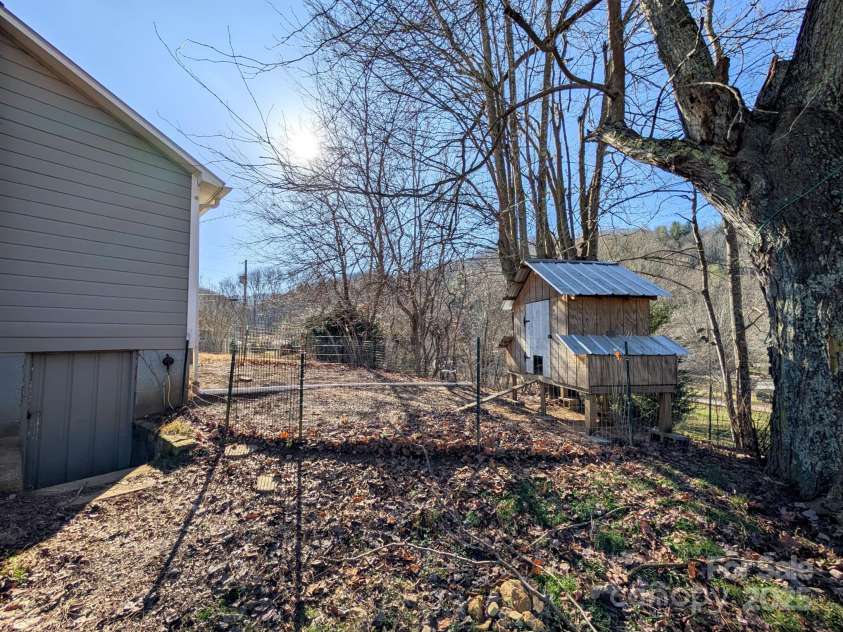95 Lady Bug Lane, Burnsville, NC 28714.  MLS# CAR4206406, YatesRealty ID 13600. Chicken coop already set up, just bring the chickens!