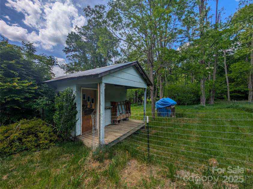95 Lady Bug Lane, Burnsville, NC 28714.  MLS# CAR4206406, YatesRealty ID 13600. Small shed on back portion of property