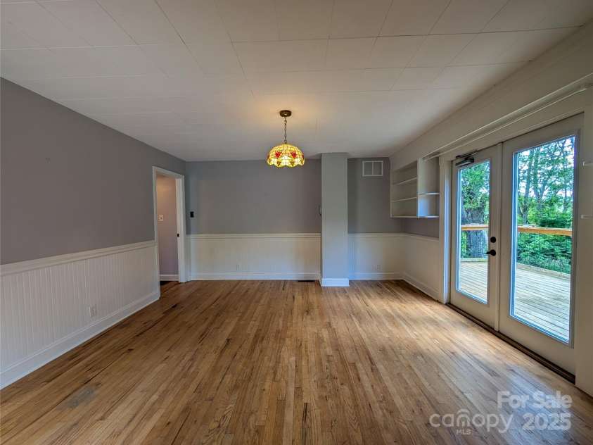 95 Lady Bug Lane, Burnsville, NC 28714.  MLS# CAR4206406, YatesRealty ID 13600. View of dining area from kitchen