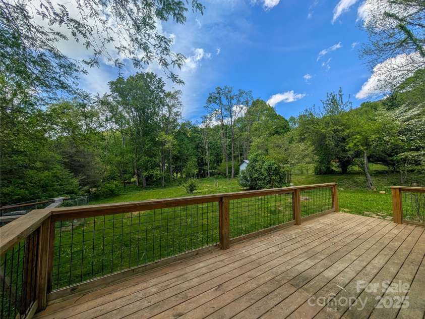 95 Lady Bug Lane, Burnsville, NC 28714.  MLS# CAR4206406, YatesRealty ID 13600. View of property from deck.