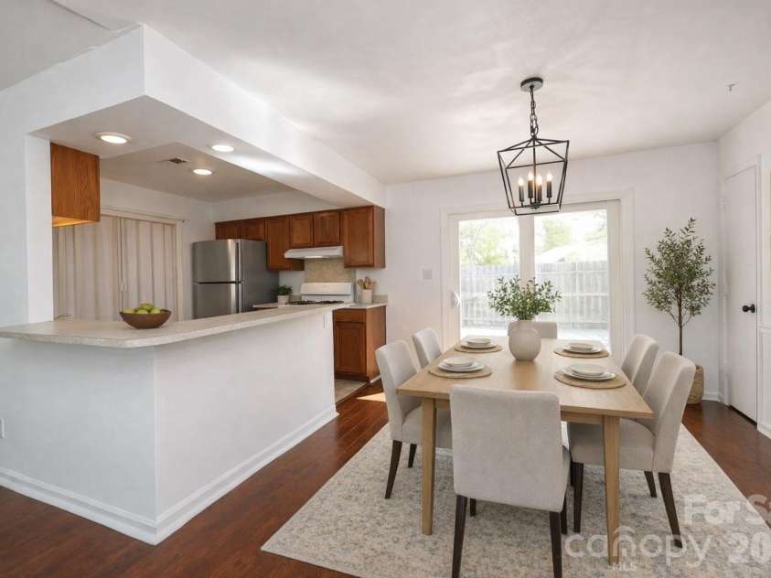 11222 Treebark Drive, Pineville, NC 28134.  MLS# CAR4370520, YatesRealty ID 13605. Virtually staged Dining area