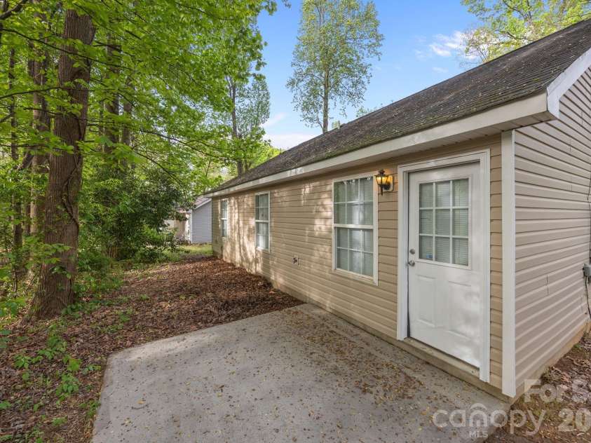 2246 Sunset Boulevard, Charlotte, NC 28269.  MLS# CAR4366304, YatesRealty ID 13610. Back of Home