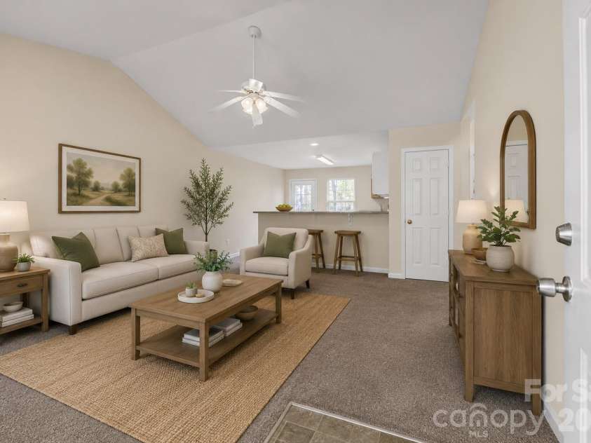 2246 Sunset Boulevard, Charlotte, NC 28269.  MLS# CAR4366304, YatesRealty ID 13610.  Living Room to the Kitchen - Virtually Staged