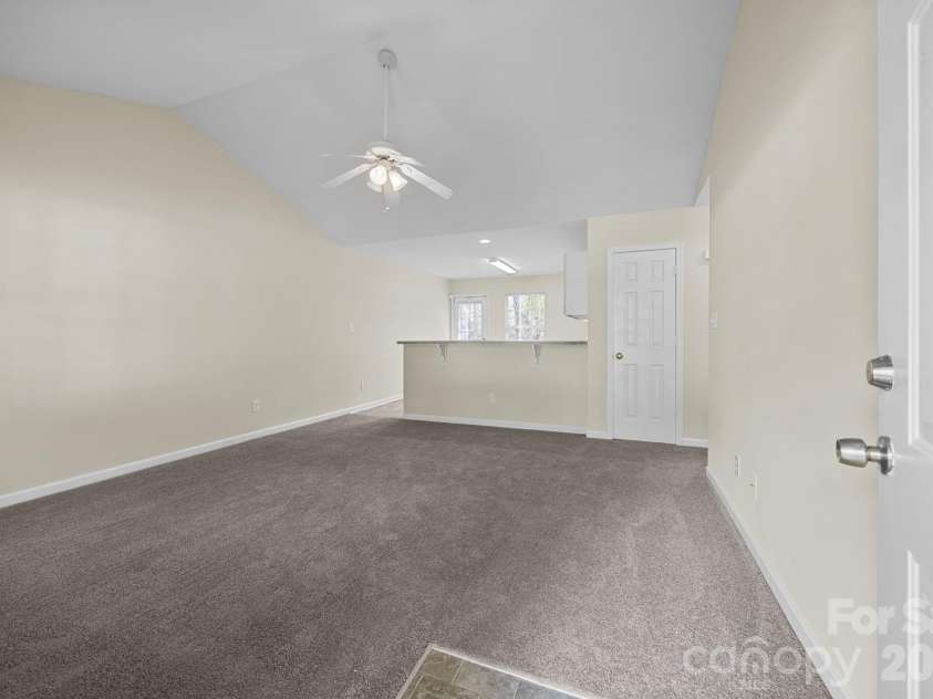 2246 Sunset Boulevard, Charlotte, NC 28269.  MLS# CAR4366304, YatesRealty ID 13610. Living Room with New Carpet