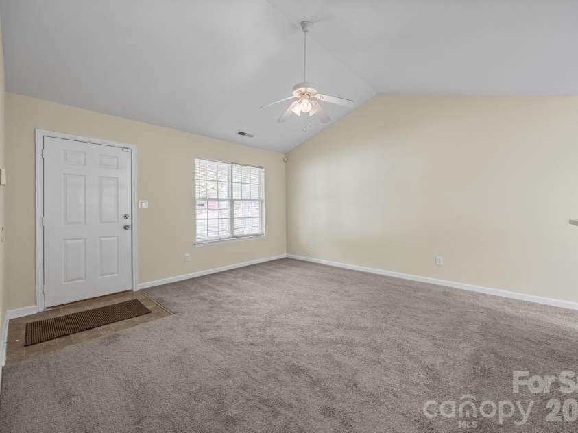 2246 Sunset Boulevard, Charlotte, NC 28269.  MLS# CAR4366304, YatesRealty ID 13610. Living Room with New Carpet