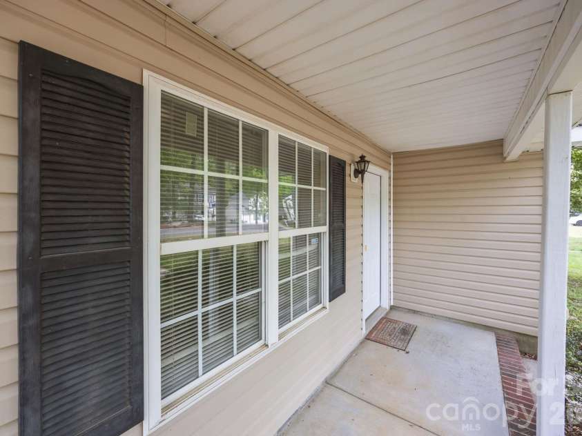 2246 Sunset Boulevard, Charlotte, NC 28269.  MLS# CAR4366304, YatesRealty ID 13610. Rocking Chair Front Porch