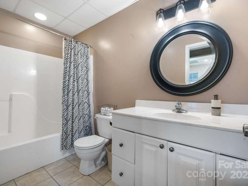 892 Plantation Drive, Marion, NC 28752.  MLS# CAR4228017, YatesRealty ID 13610. Basement bath