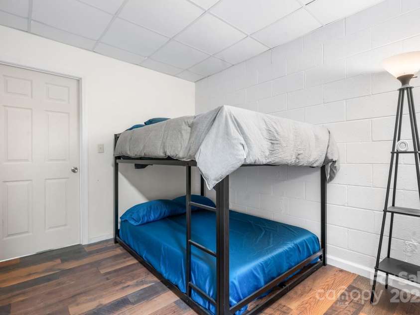 892 Plantation Drive, Marion, NC 28752.  MLS# CAR4228017, YatesRealty ID 13610. Basement flex space