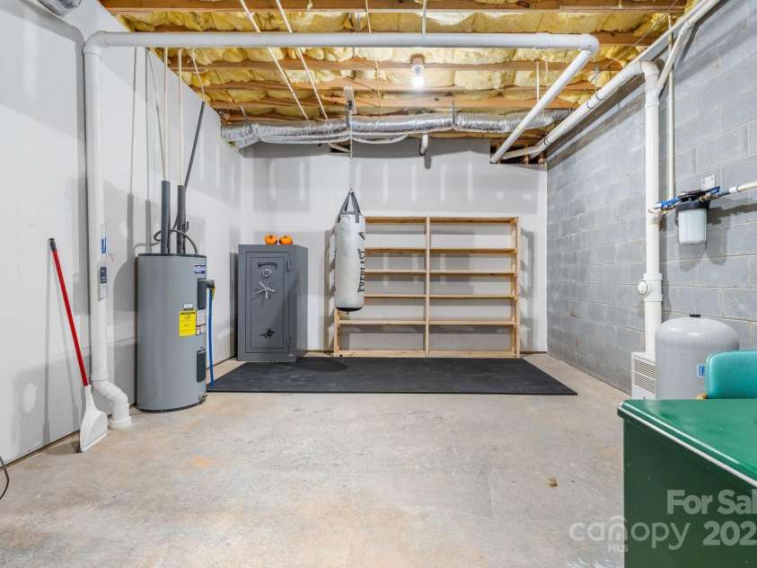 892 Plantation Drive, Marion, NC 28752.  MLS# CAR4228017, YatesRealty ID 13610. Basement Storage