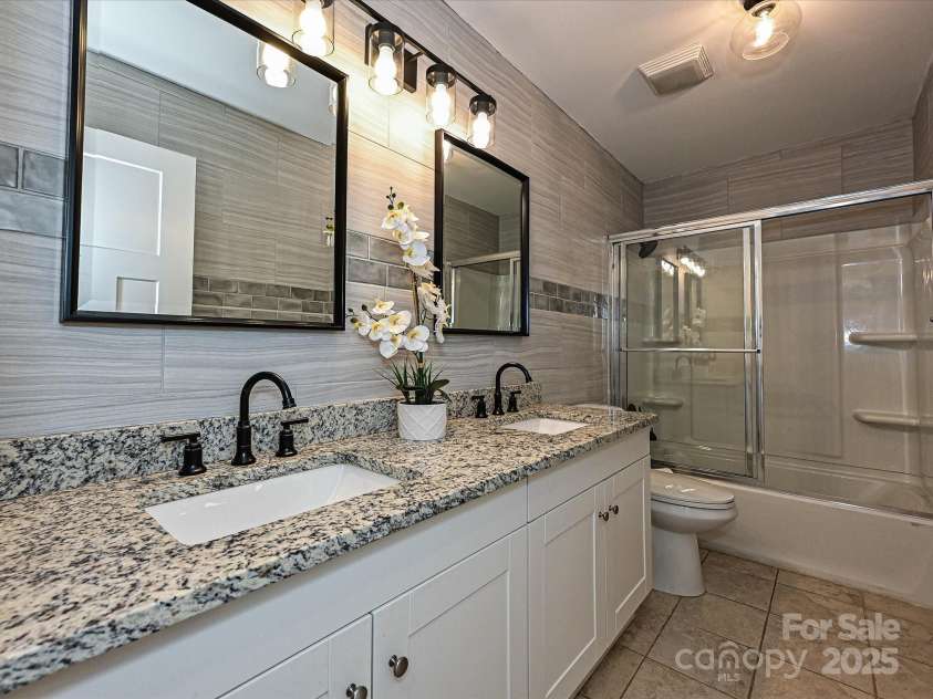 9565 Man O War Road, Indian Land, SC 29707.  MLS# CAR4253660, YatesRealty ID 13613. Hall Bathroom