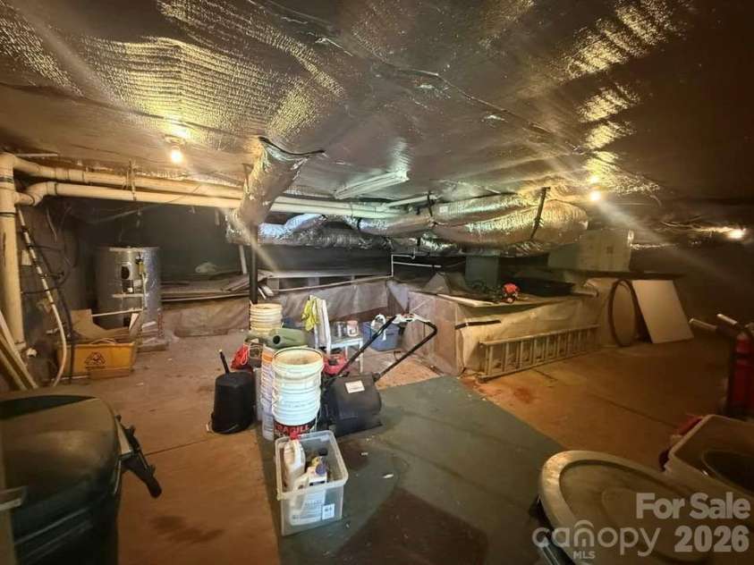 160 Caledonia Road, Landrum, SC 29356.  MLS# CAR4314636, YatesRealty ID 13619. Crawlspace area and great additional storage
