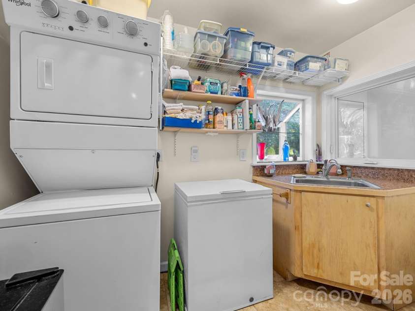 160 Caledonia Road, Landrum, SC 29356.  MLS# CAR4314636, YatesRealty ID 13619. Laundry on main with greenhouse window for plants