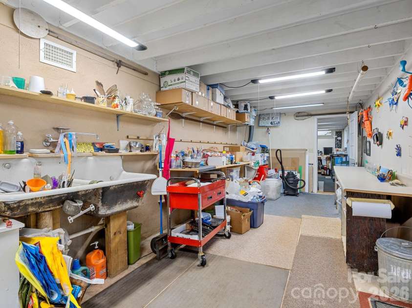 160 Caledonia Road, Landrum, SC 29356.  MLS# CAR4314636, YatesRealty ID 13619. Non-climate controlled space in the basement