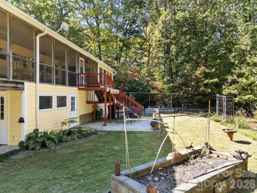 160 Caledonia Road, Landrum, SC 29356.  MLS# CAR4314636, YatesRealty ID 13619. Patio and raised beds
