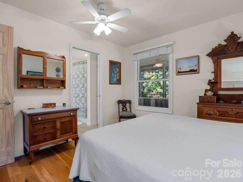 160 Caledonia Road, Landrum, SC 29356.  MLS# CAR4314636, YatesRealty ID 13619. Primary bedroom with en-suite bath