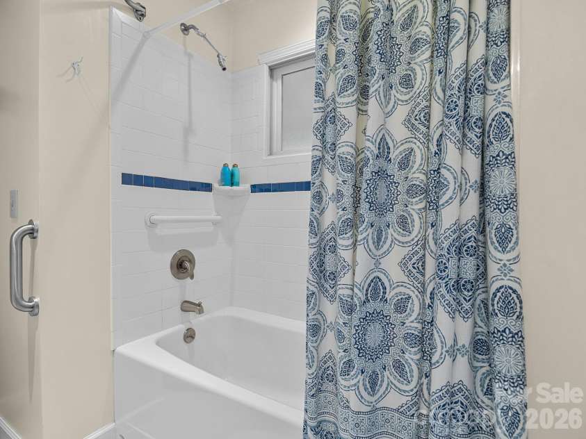 160 Caledonia Road, Landrum, SC 29356.  MLS# CAR4314636, YatesRealty ID 13619. Shower/tub in primary bathroom