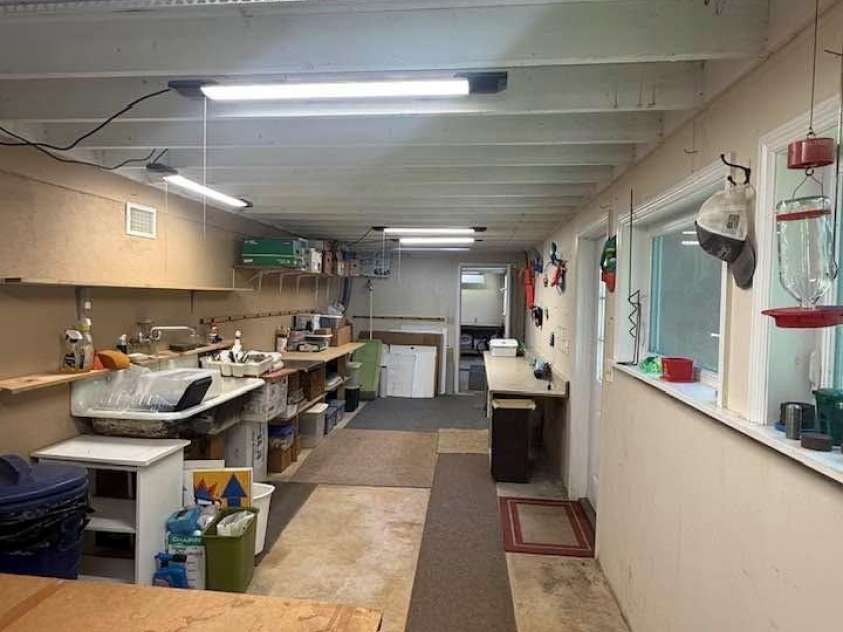 160 Caledonia Road, Landrum, SC 29356.  MLS# CAR4314636, YatesRealty ID 13619. Unfinished basement studio/storage