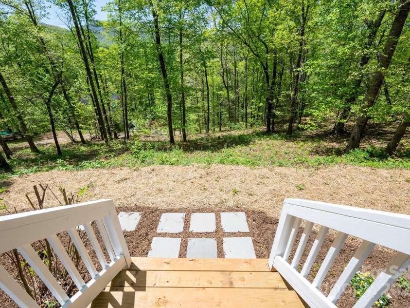 62 Mackenzie Way, Swannanoa, NC 28778.  MLS# CAR4252201, YatesRealty ID 13625. Just Steps from Nature