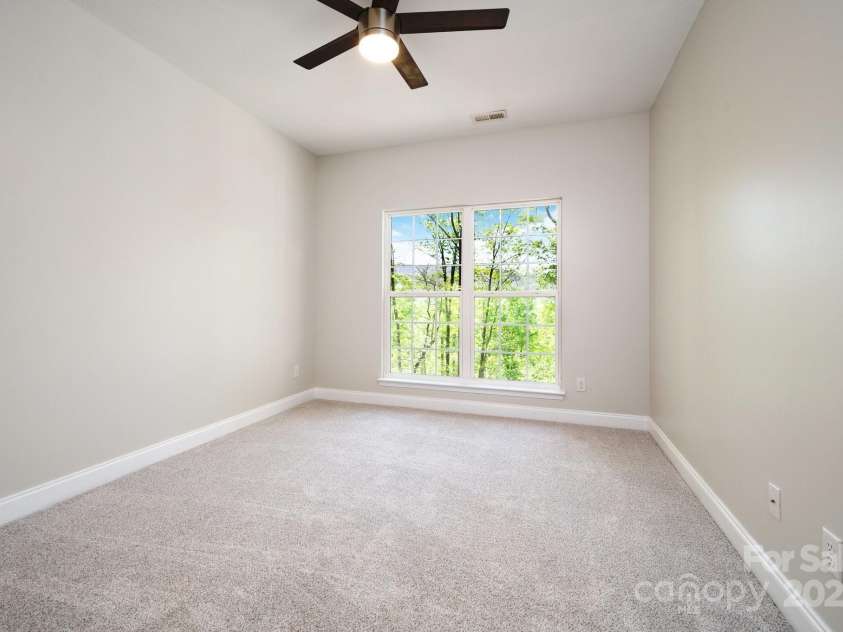 62 Mackenzie Way, Swannanoa, NC 28778.  MLS# CAR4252201, YatesRealty ID 13625. Oversized Windows to take in Nature
