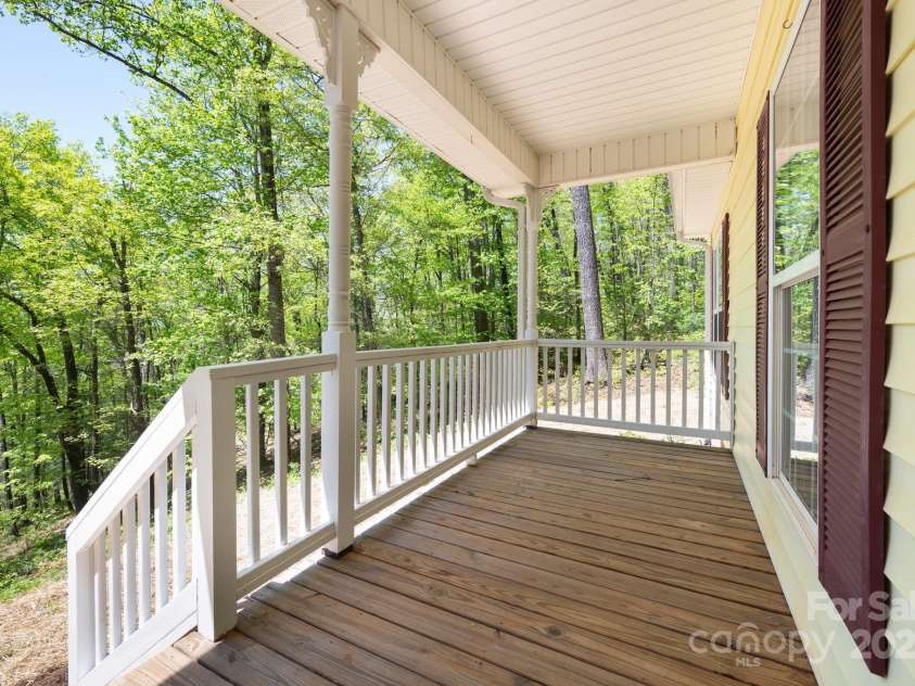62 Mackenzie Way, Swannanoa, NC 28778.  MLS# CAR4252201, YatesRealty ID 13625. Relax on this Charming Front Porch