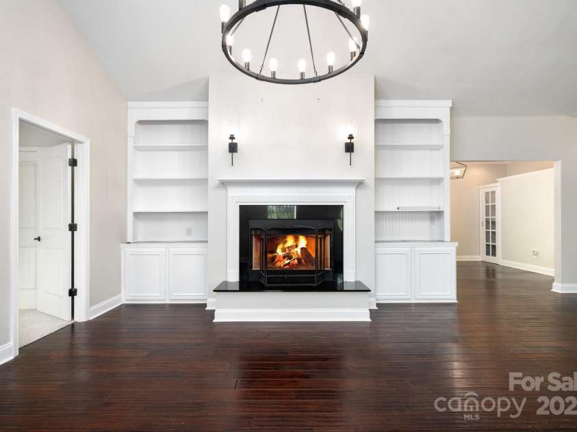 62 Mackenzie Way, Swannanoa, NC 28778.  MLS# CAR4252201, YatesRealty ID 13625. Wood-Burning Fireplace with built-in Shelving